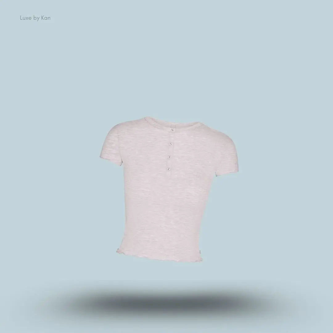 SKIMS Sleep Henley and Foldover Short Set henley top in Light Heather Grey, flat lay on light blue background