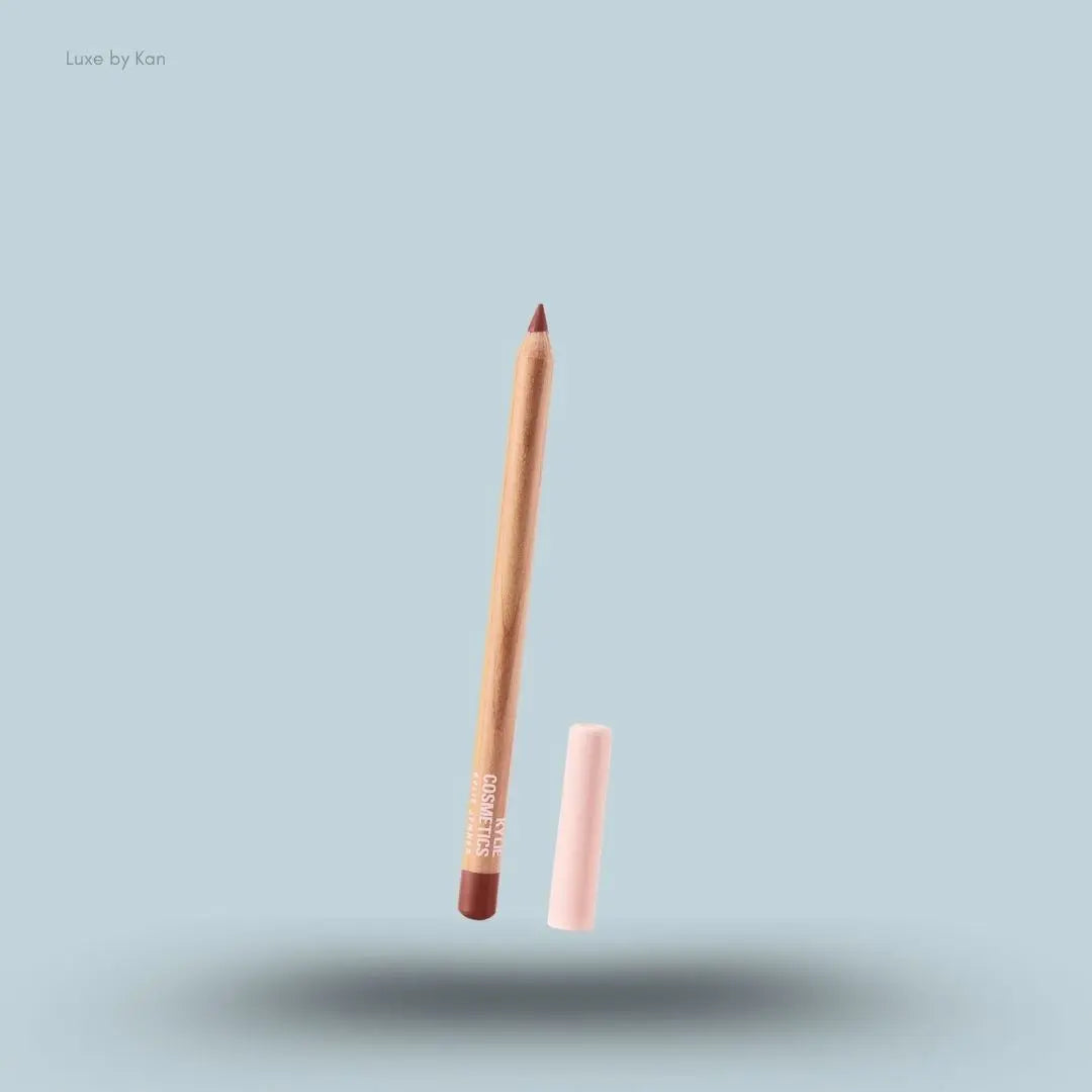 Kylie Cosmetics Precision Pout Lip Liner pencil on blue background — Luxe by Kan India