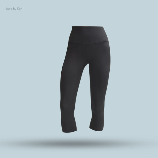 Black cropped leggings, featuring a high waistband for comfort and flexibility.
