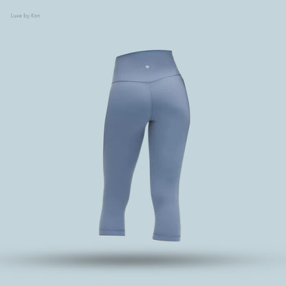 Light blue, high-waisted leggings, showcasing a sleek, modern design.