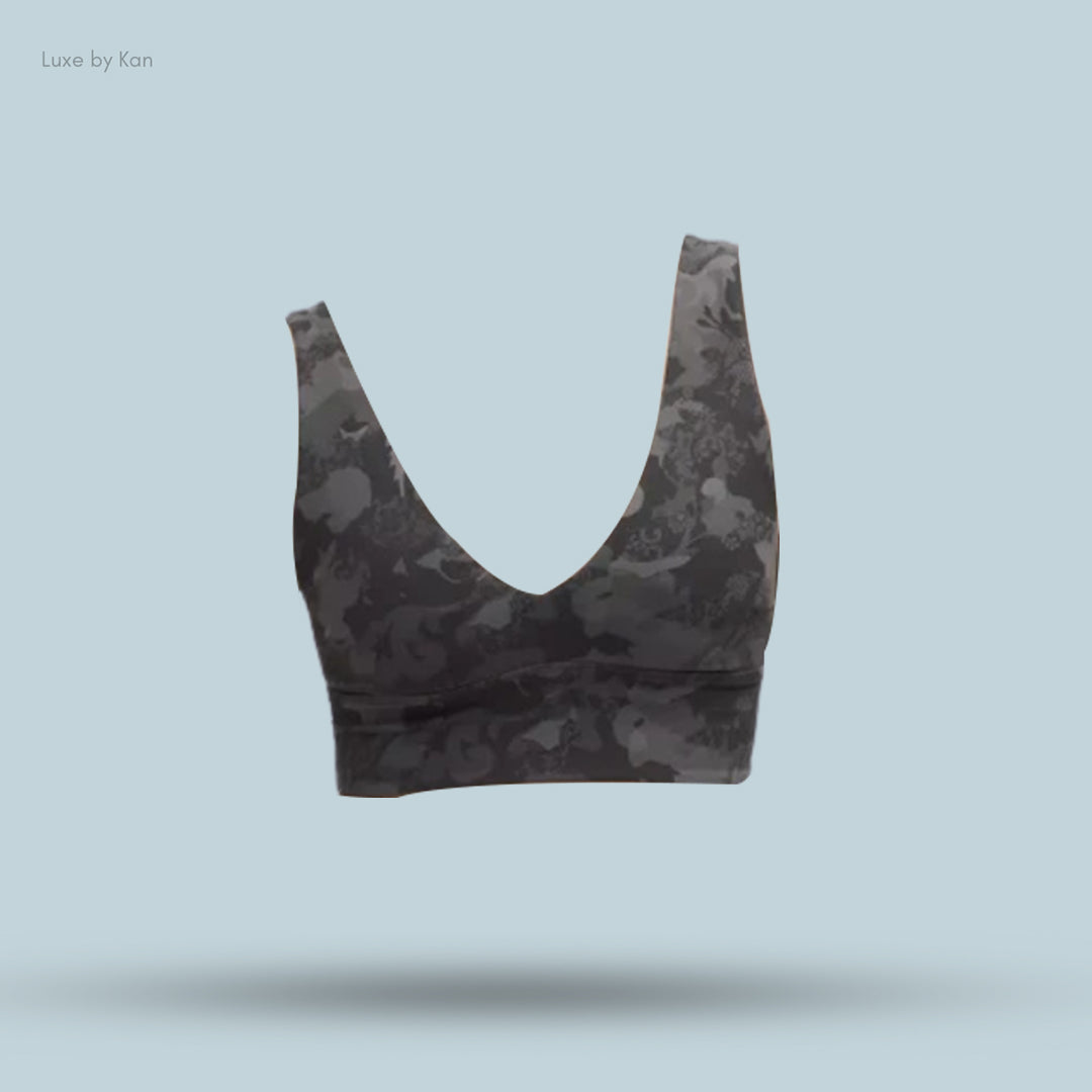 A stylish black Lululemon Align™ V-Neck Bra with light support for C/D cups, featuring a deep V-neck and wide straps.