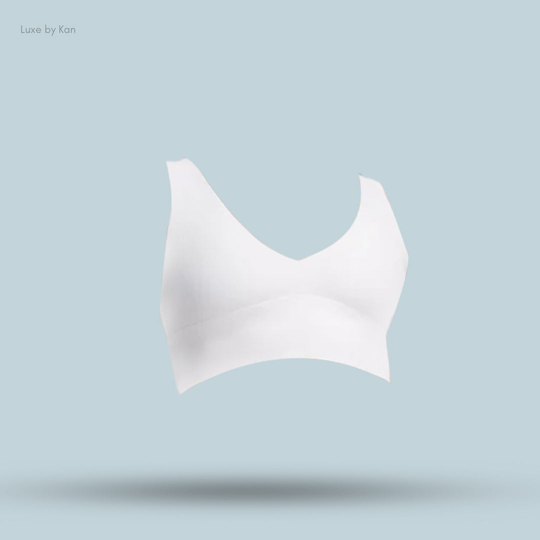 White seamless bralette, showcasing its modern design and comfortable fit.