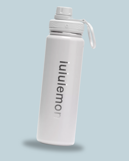 A sleek, white water bottle with "lululemon" printed in silver, featuring a twist cap and a carry loop.