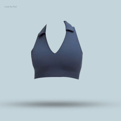 A navy Lululemon Collared Tennis Longline Bra with medium support for B/C cups, featuring a plunging neckline and a stylish collar.