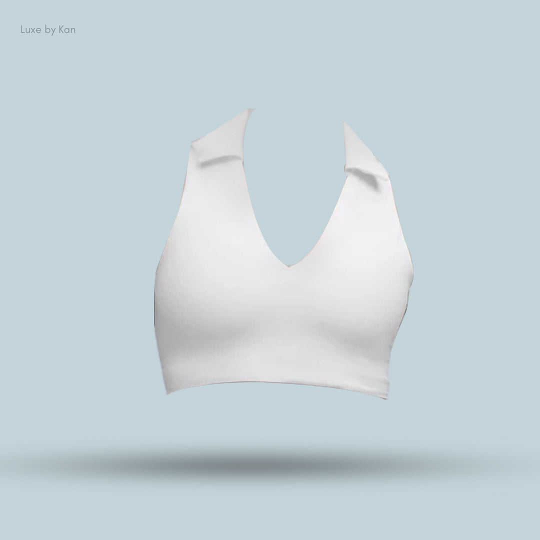 A stylish white halter top with a deep V-neck and collar.