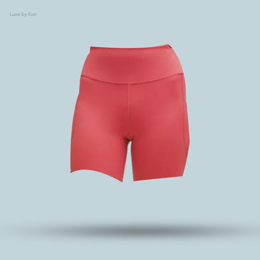 Bright red Lululemon Fast and Free High-Rise 6" Shorts with 5 pockets, featuring a high waistband and a sleek, modern design.