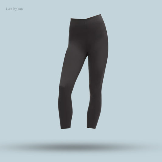 Black Lululemon high-waisted leggings, showcasing a sleek design and stretchy, form-fitting fabric.