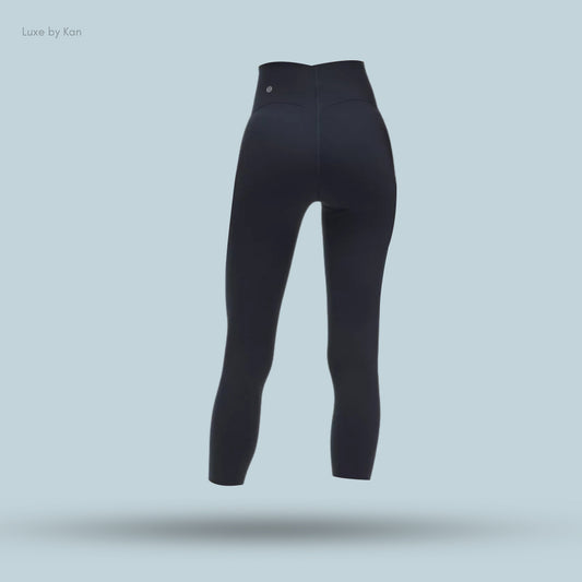 Black high-waisted leggings, showcasing the back design and Lululemon branding.
