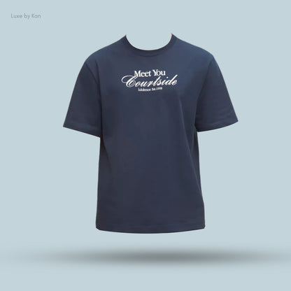 Navy blue t-shirt featuring white text that reads "Meet You Courtside" and "lululemon Est. 1998" on the fron.