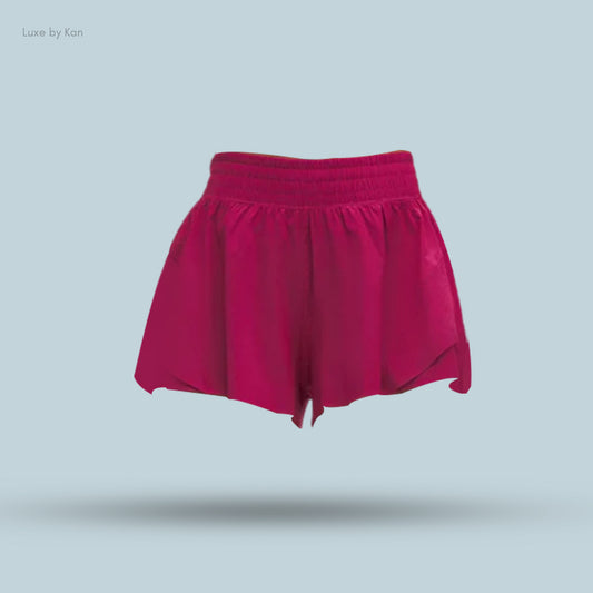 Bright fuchsia women's shorts with an elastic waistband. Perfect for casual wear.