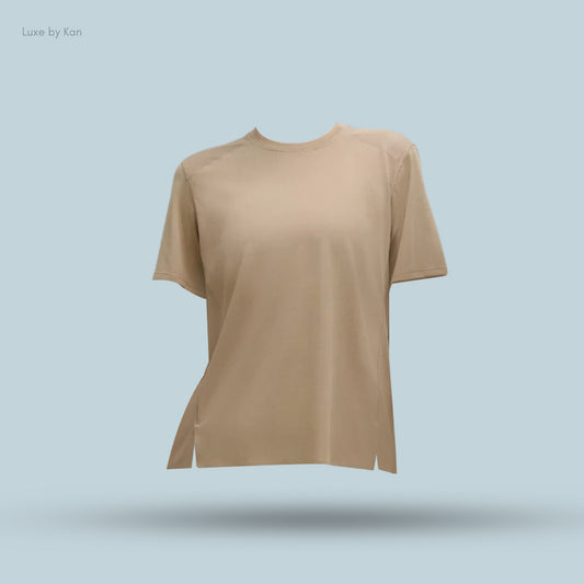 A lightweight, light beige Lululemon Fast and Free short-sleeve shirt for women, highlighting its simple and elegant design.
