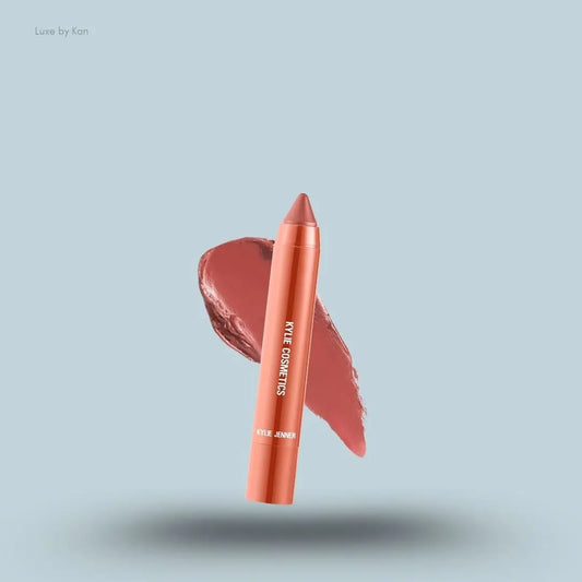 Kylie Cosmetics Matte Lip Crayon stick and swatch on blue background — Luxe by Kan India