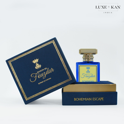 Blue perfume bottle labeled "Maison de Fauzdar - Bohemian Escape," displayed in an elegant navy box with gold accents.