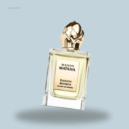Maison Mataha Évasion Bonbon Extrait de Parfum bottle featuring a golden cap sculpted in an elegant floral design.