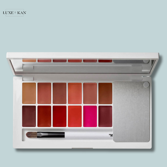 Makeup by mario master mattes pro lip palette featuring 15 vibrant shades, from nudes to bold pinks, alongside a brush for precise application.