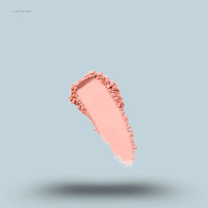 Kylie Cosmetics Pressed Blush Powder swatch on blue background — LBK India