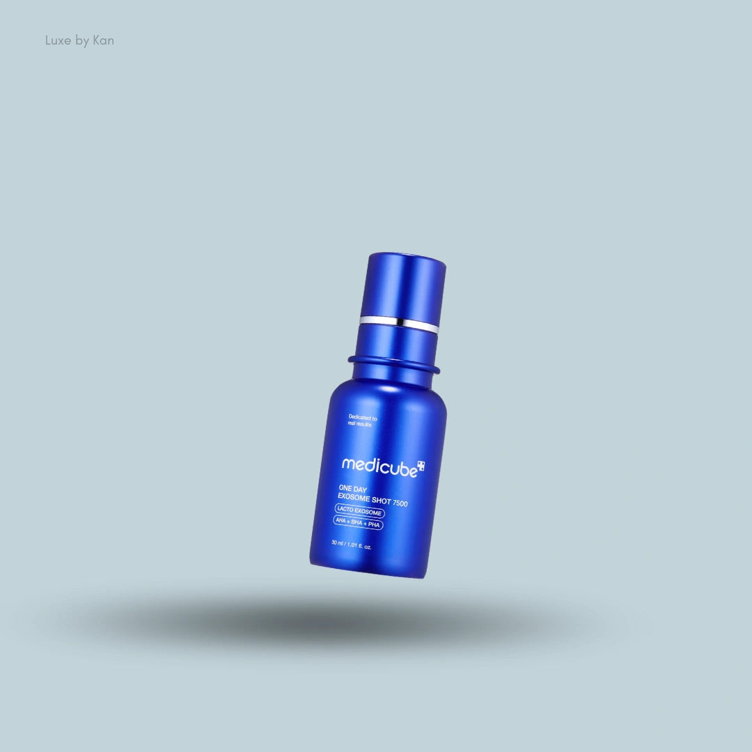 A blue Medicube One Day Exosome Shot Pore Ampoule 7500 bottle floats over a light blue background with a soft shadow.