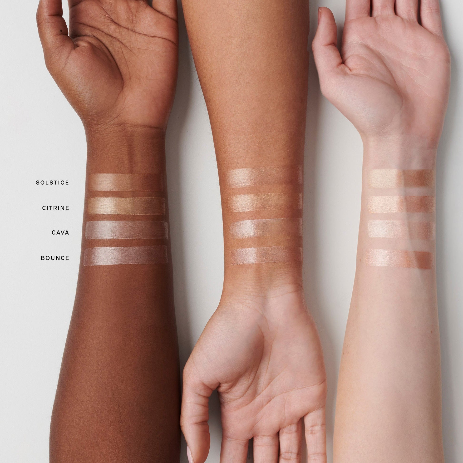 Four arms with diverse skin tones display swatches of highlighter shades: Solstice, Citrine, Cava, and Bounce.