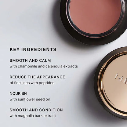 Close-up of cosmetic containers highlighting key ingredients: chamomile, calendula, peptides, sunflower seed oil, and magnolia bark extract.