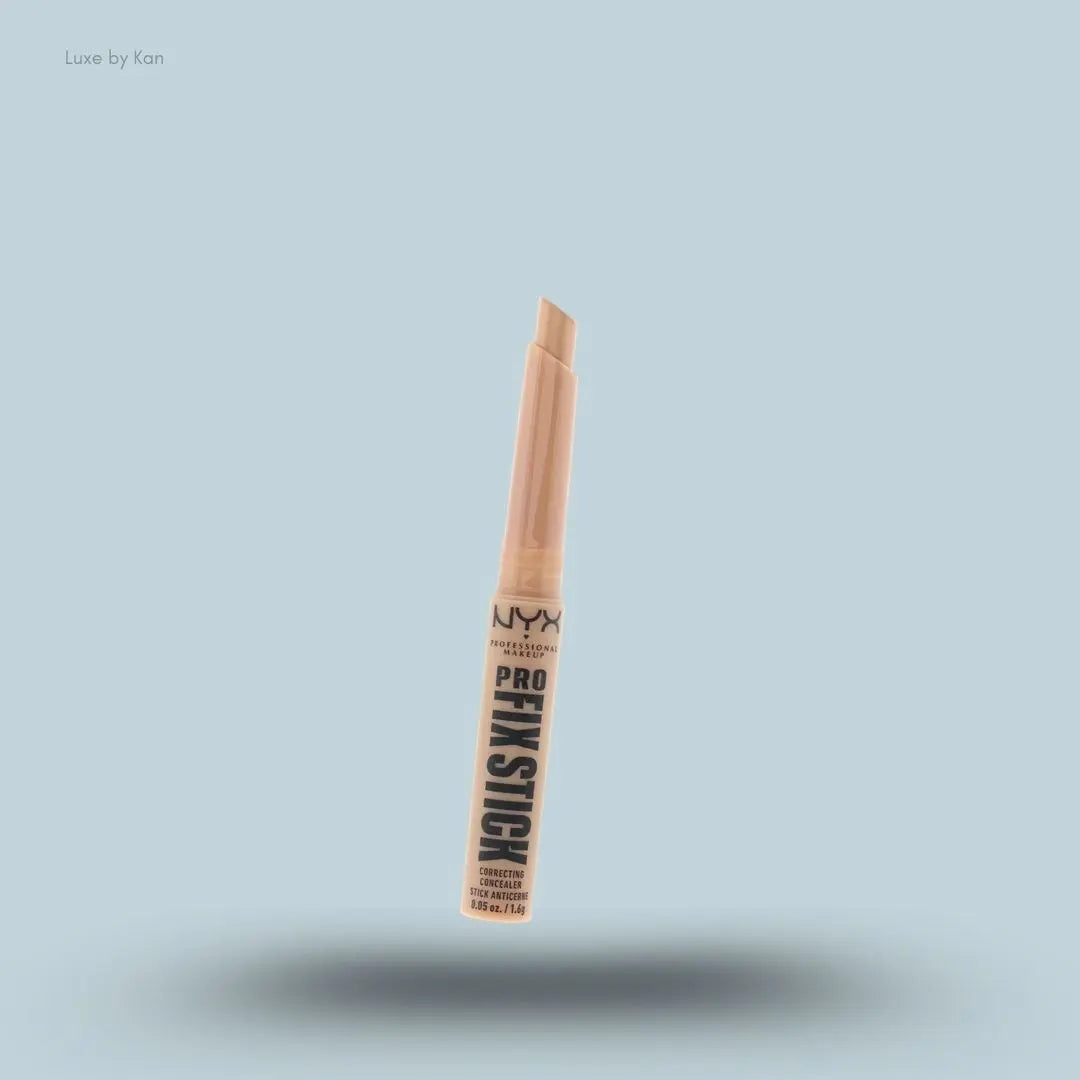 NYX Pro Fix Stick Concealer Neutral Tan stick on blue background — Luxe by Kan India