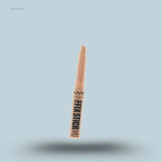 NYX Pro Fix Stick Concealer Neutral Tan stick on blue background — Luxe by Kan India
