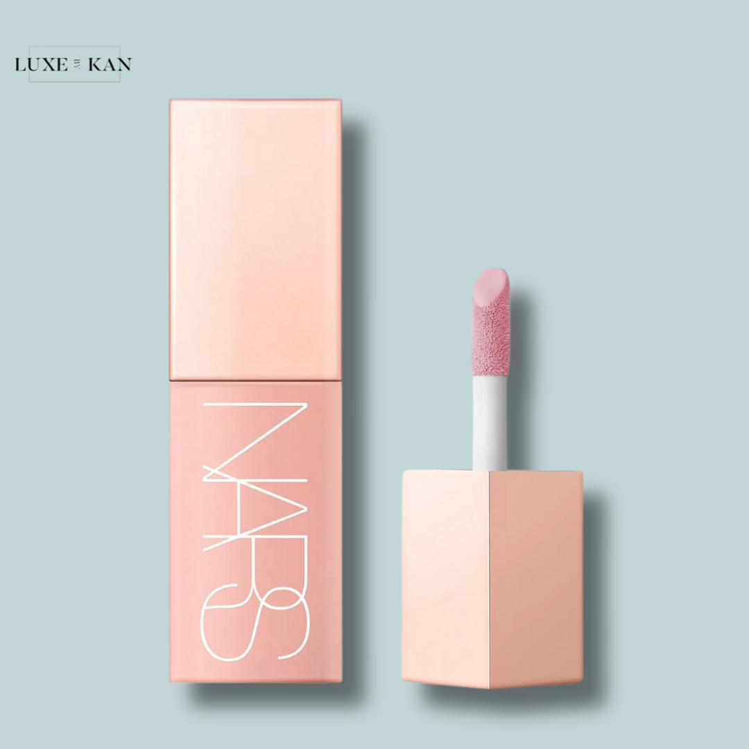 Nars afterglow liquid blush in a pink tube, with a doe-foot applicator.