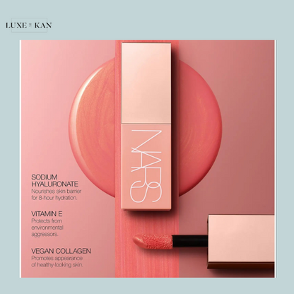 NARS lip product on a soft pink background, showcasing benefits: Sodium Hyaluronate, Vitamin E, and Vegan Collagen for healthy skin.