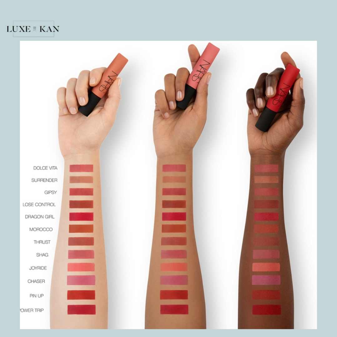Three models display NARS lipstick shades on their arms, showcasing various hues from soft nudes to deep reds.