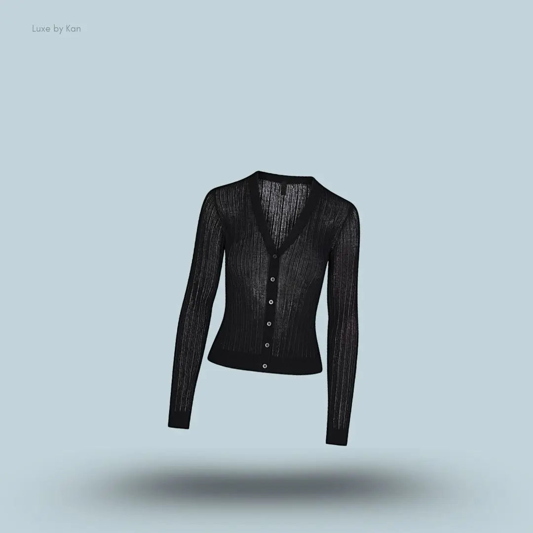 SKIMS Sheer Knit Cardigan in Onyx, flat lay on light blue background