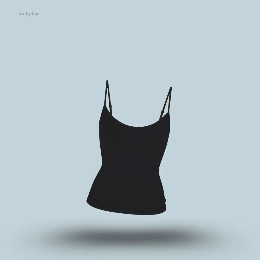 SKIMS Sleep Cami in Onyx, flat lay on light blue background