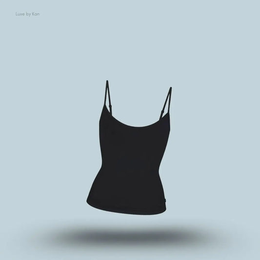 SKIMS Sleep Cami in Onyx, flat lay on light blue background