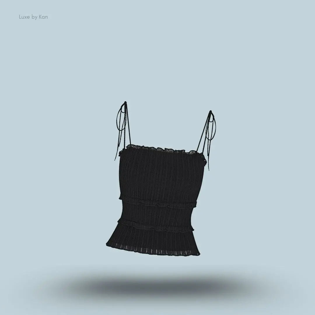 SKIMS Sheer Knit Ruffle Cami in Onyx, flat lay on light blue background