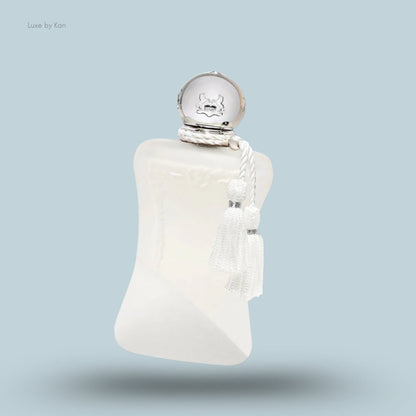 Parfums de Marly Valaya Eau de Parfum in a frosted white bottle with a silver cap adorned with a heraldic emblem and a white tassel detail.