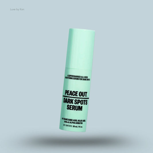 Mint green bottle of Peace Out Dark Spots Serum.