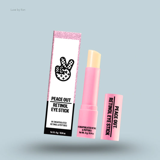 Peace Out Retinol Eye Stick with product packaging and open pink retinol stick.