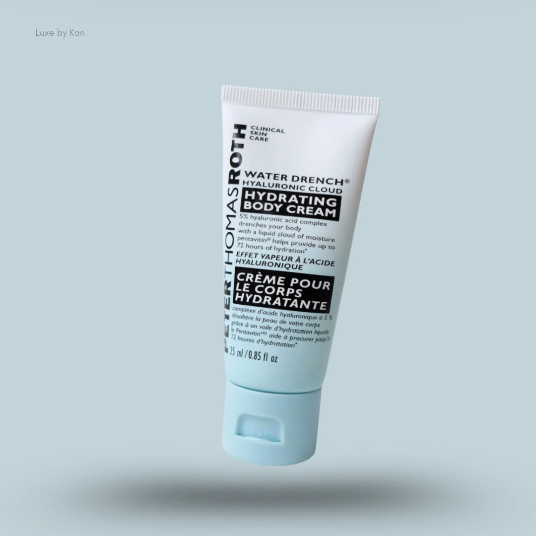 Peter Thomas Roth Water Drench Hyaluronic Cloud Hydrating Body Cream in a white tube with text detailing the product name and ingredients. The cap is a light blue shade.