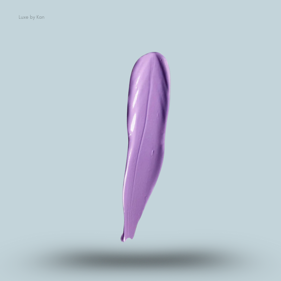 Smear of purple-toned Plouise coloured base against a pale blue background.