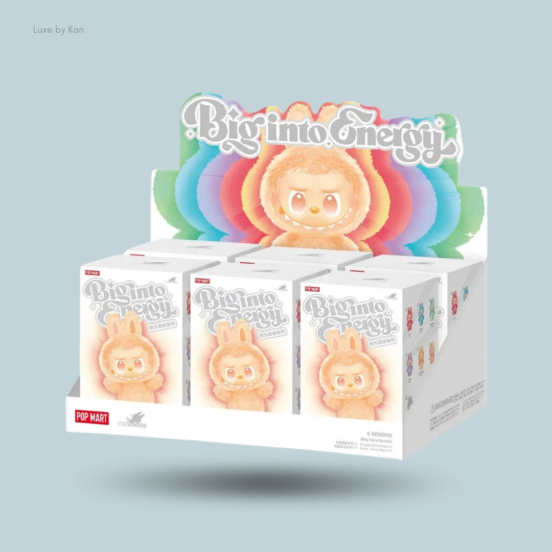 Pack of six Pop Mart Labubu Big Into Energy Series blind box toys, each featuring a doll with an orange furry hood and a whimsical facial expression.