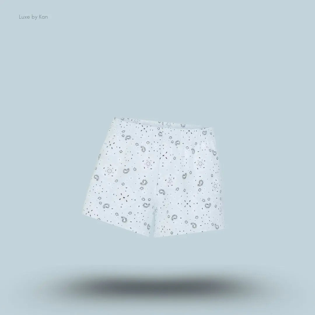 SKIMS Cotton Jersey Loose Short in Powder Blue Bandana, flat lay on light blue background