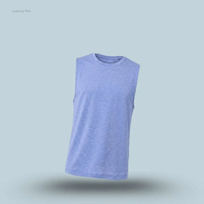 Alo Conquer Muscle Tank in Provence Blue Heather, flat lay on light blue background