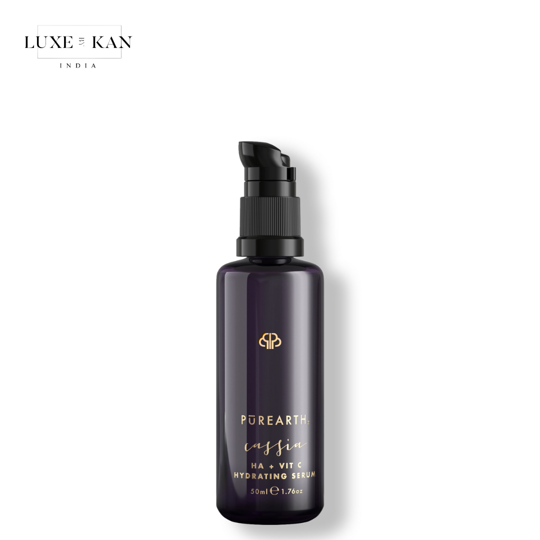 A sleek dark bottle of purearth cassia vit c+ha brightening serum, featuring a pump top.