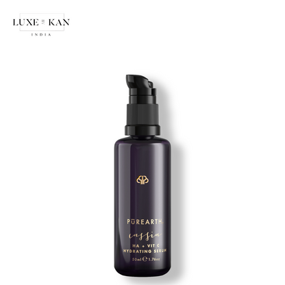 A sleek dark bottle of purearth cassia vit c+ha brightening serum, featuring a pump top.