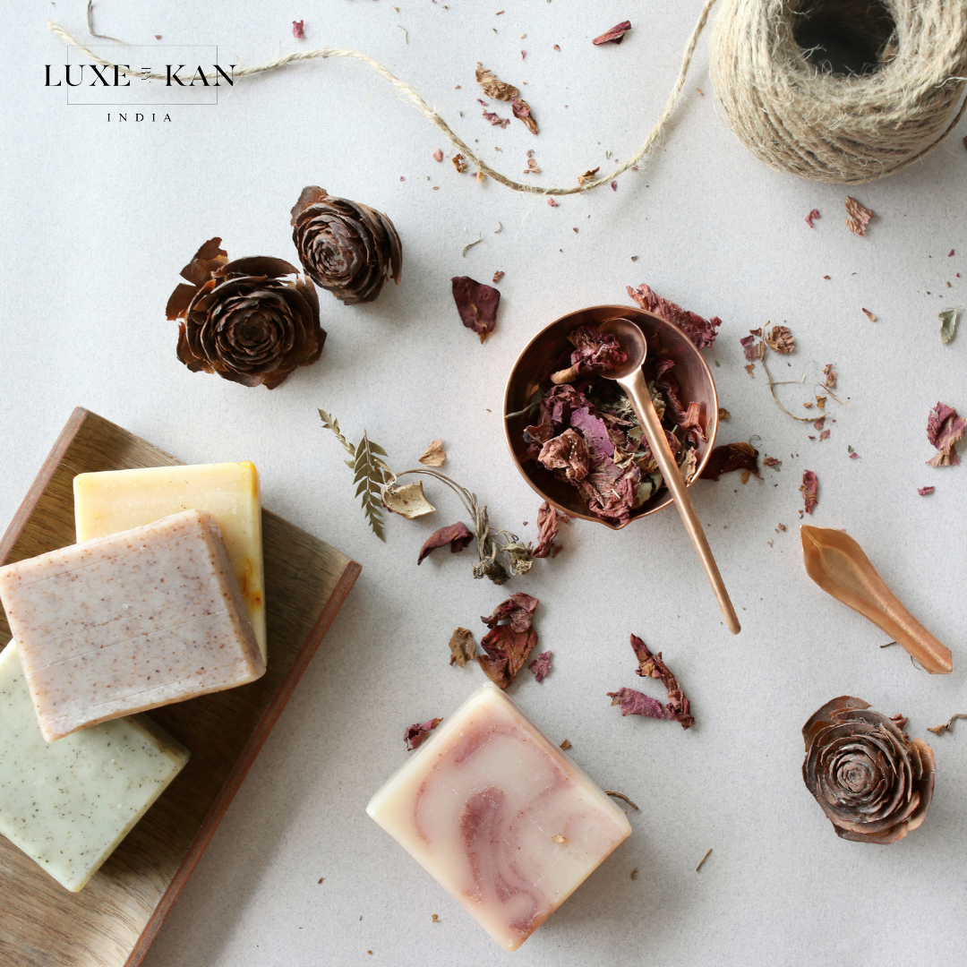Hemp & seabuckthorn luxury cold soap soaps arranged on a light surface, surrounded by dried flowers, herbs, and natural decor, creating a serene, eco-friendly aesthetic.