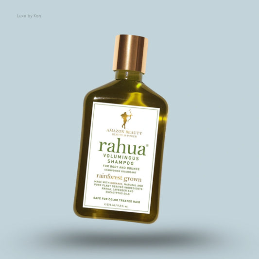 Rahua Voluminous Shampoo bottle with a gold cap.