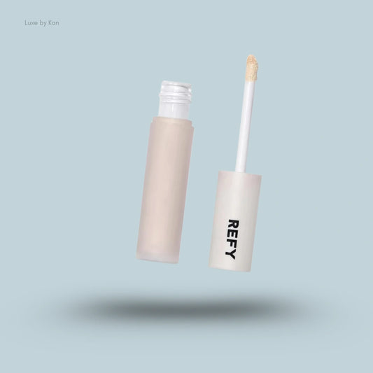 Refy concealer tube with applicator separated from the tube.