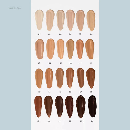 Twenty-four swatches of Refy concealer in various shades, ranging from light beige to deep brown, arranged in four rows.