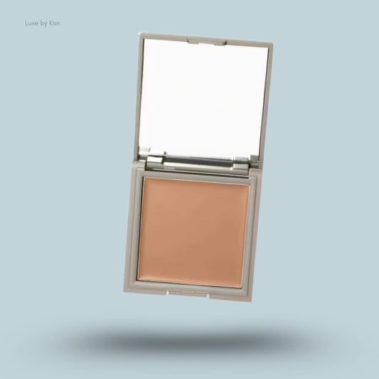 Open compact of Refy cream bronzer with mirror.