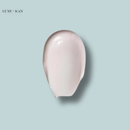 A glossy, light pink nail polish swatch of Refy face primer, showcasing a smooth and elegant finish.