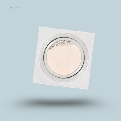 Refy skin finish powder compact with a square white casing.