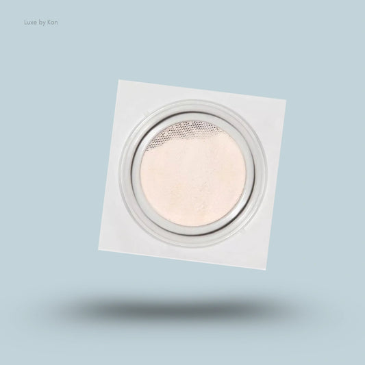 Refy skin finish powder compact with a square white casing.